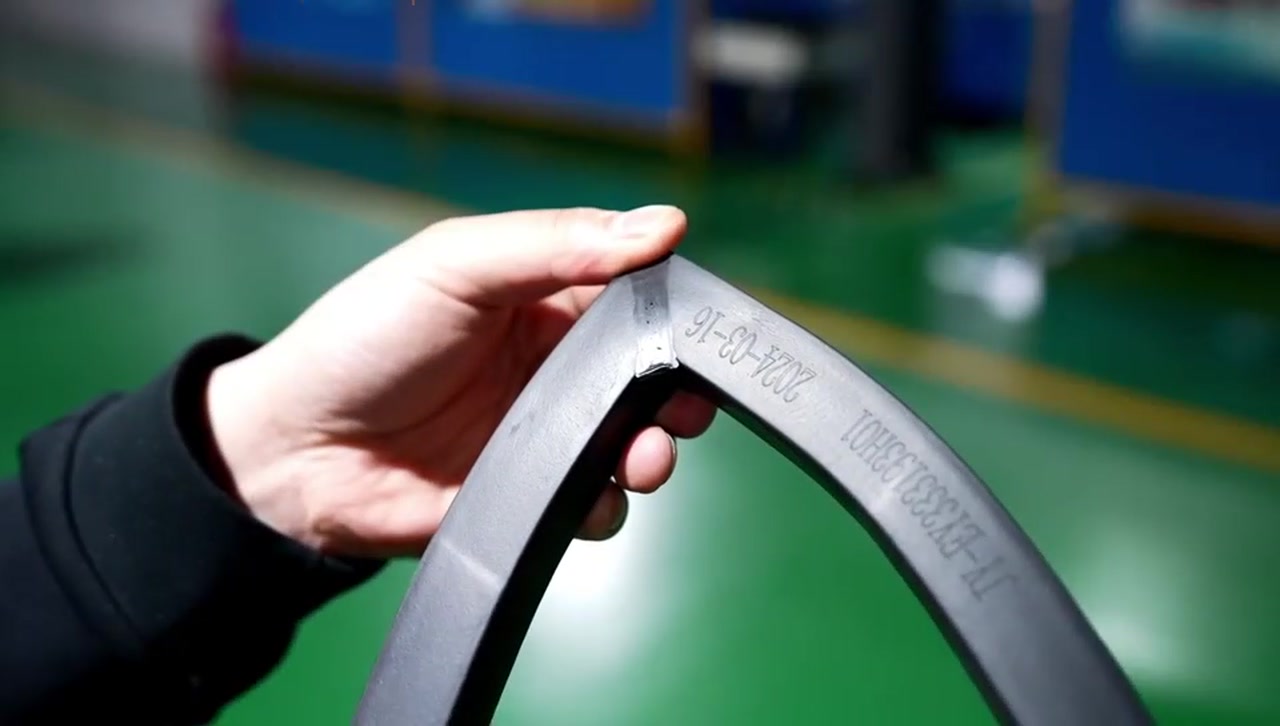 A component being checked in the SRRP factory film